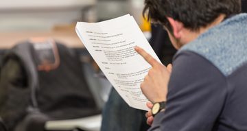 Actor reading a script.