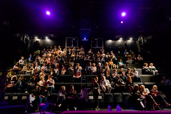 Image of Traverse 1 taken from the stage with audience taken to their seats.