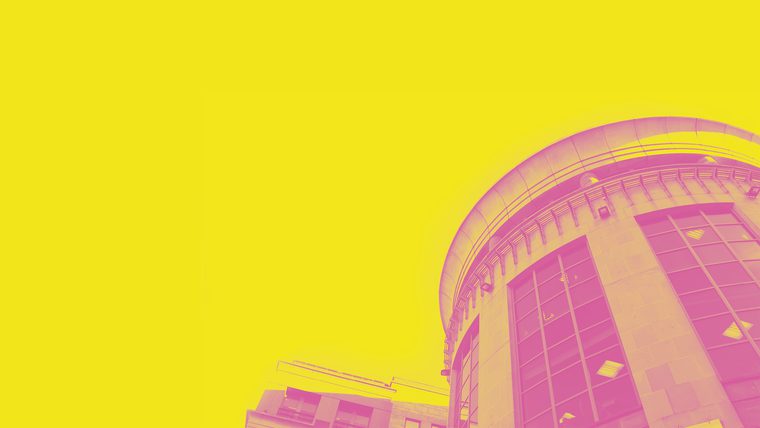 Exterior photo of the Traverse Theatre. The image has been treated with a vibrant yellow and pink wash.